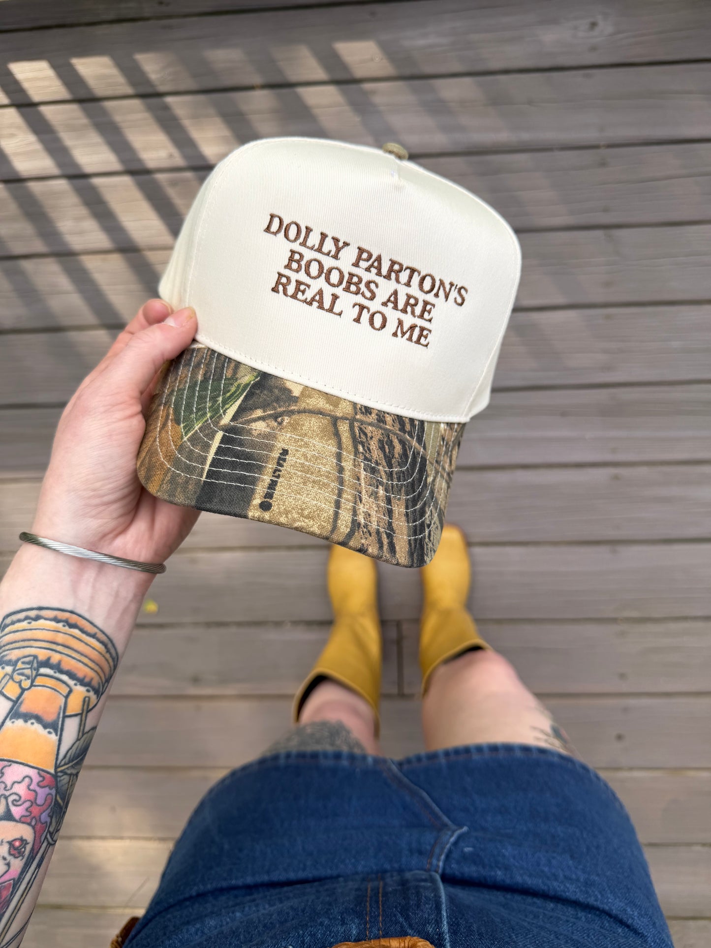 Dolly Parton’s boobs are real to me (5 panel/ tan/camo)